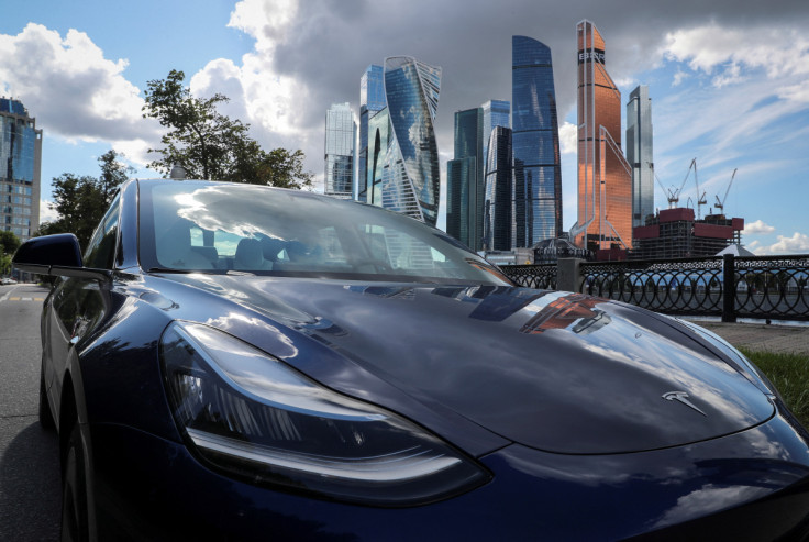 A Tesla Model 3 electric vehicle is shown in Moscow