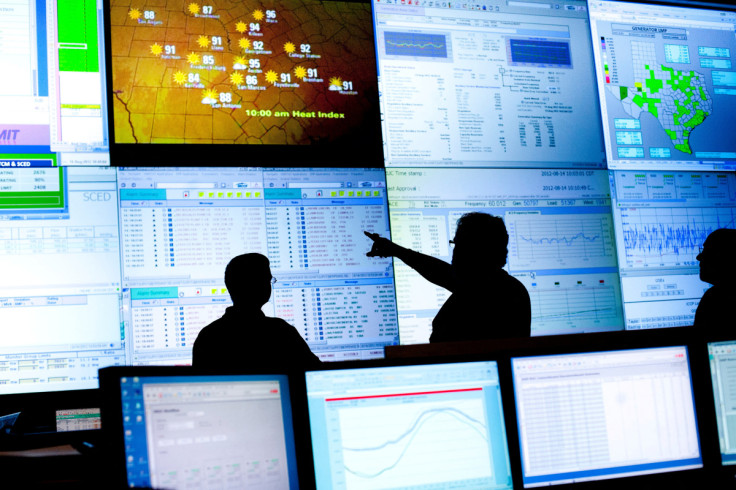 Reliability coordinators monitor the state power grid during a tour of the Electric Reliability Council of Texas (ERCOT) command center in Taylor