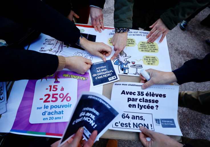 Teachers prepare placards in Cannes ahead of a nationwide strike against pension reform