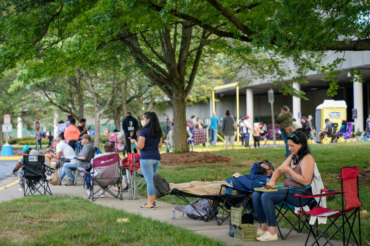 People wait outside Kentucky Career Center in Frankfort