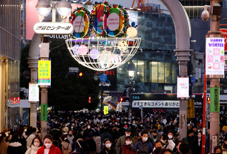 People make their way at a shopping district in Tokyo