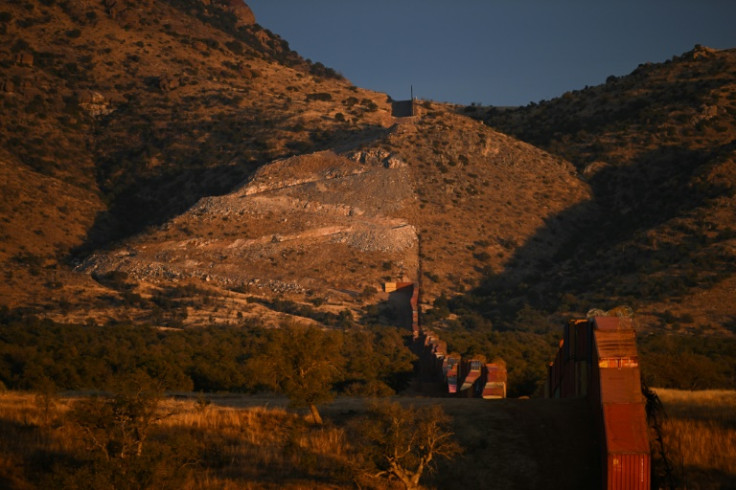 Before the containers arrived in the Coronado National Forest -- an area that can only be reached by dirt roads -- the border here was demarcated by a wire fence