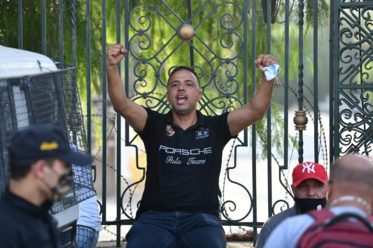 Tunisian MP Seifeddine Makhlouf gestures outside parliament after the military cordoned it off on July 26, 2021