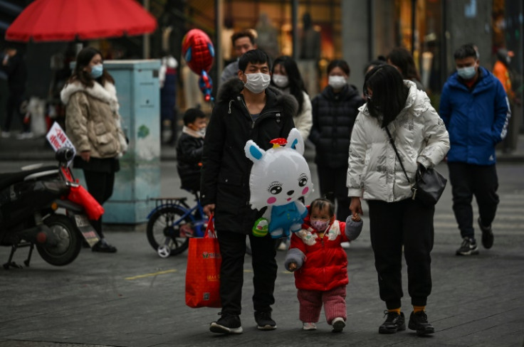 Wuhan, the Chinese city synonymous with with Covid-19, springs back to life for Lunar New Year's Eve, but many are mourning family members lost during the pandemic