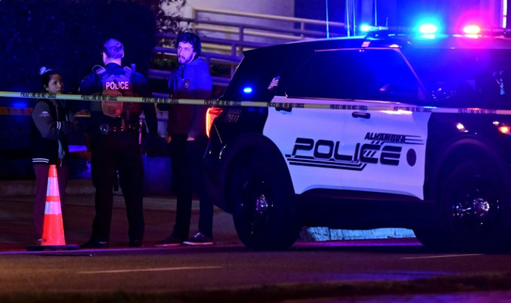 Police patrol the scene in Monterey Park, California, where officers were responding to reports of multiple people shot