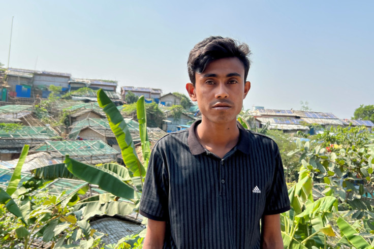 Enayet Ullah poses for a picture inside a refugee camp in Cox's Bazar