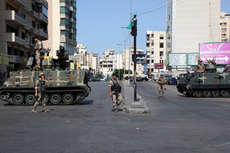 Army soldiers are deployed after gunfire erupted in Beirut