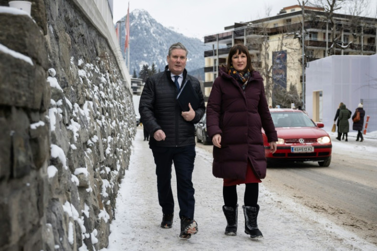 Labour leader Keir Starmer (L) and his finance spokeswoman Rachel Reeves (R) were in Davos this month