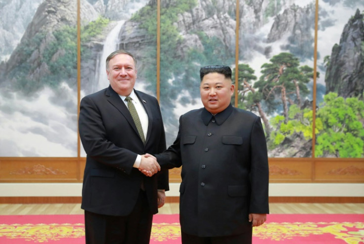 North Korea's leader Kim Jong Un shakes hands with then US secretary of state Mike Pompeo in Pyongyang in October 2018