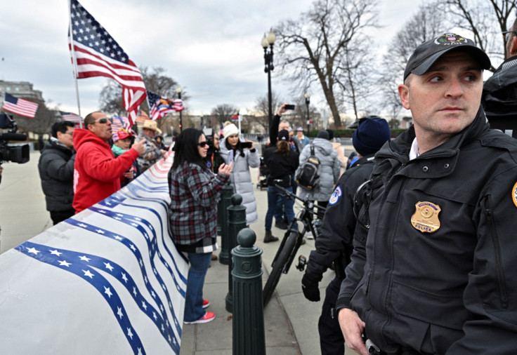 Supporters of those arrested in the January 6, 2021 attack on the U.S. Capitol protest between the U.S. Supreme Court and the Capitol in Washington