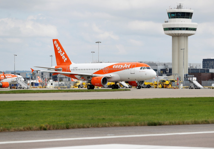 An Easyjet Airbus aircraft taxis close to the northern runway at Gatwick Airport in Crawley