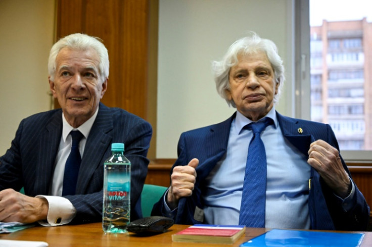 Lawyer Genri Reznik (R) called the justice ministry's request to shut down the group a 'legal disgrace'