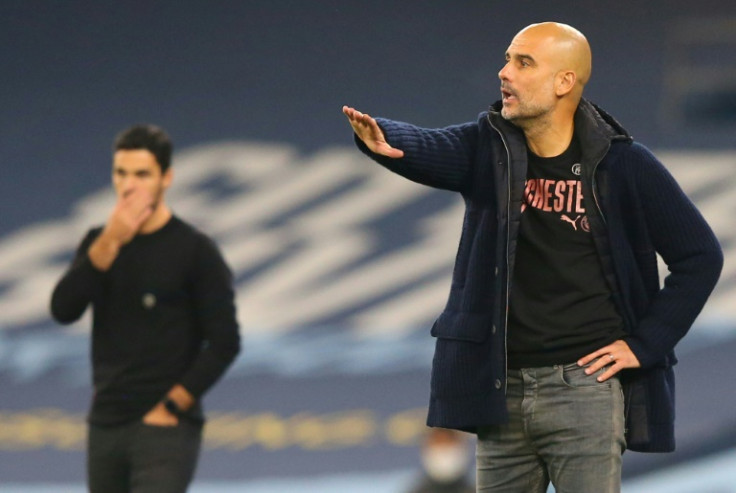 Arsenal manager Mikel Arteta (left) is going head to head with Manchester City boss Pep Guardiola in the FA Cup