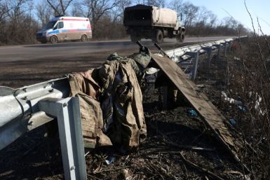 A stretcher and discarded Ukrainian military equipment on a roadside not far from Bakhmut in Donetsk