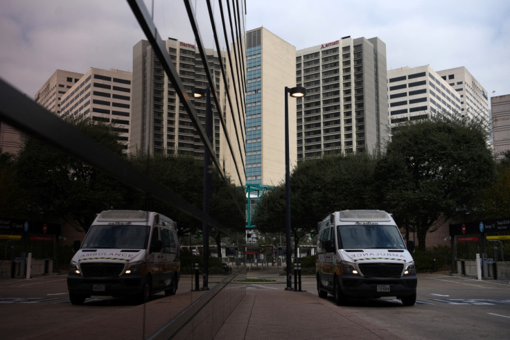 Healthcare workers arrive for a shift change in Texas