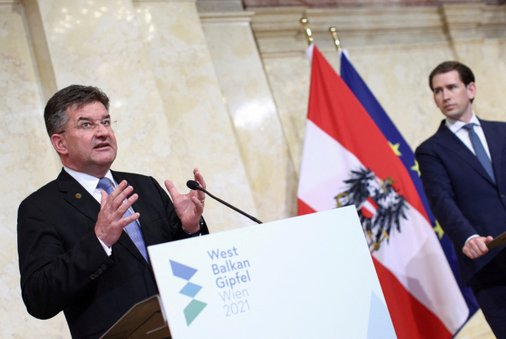 The EU's Special Representative for Belgrade-Pristina Dialogue, Miroslav Lajcak (L), and then-Austrian Chancellor Sebastian Kurz attend a Western Balkans conference at the Chancellery in Vienna,