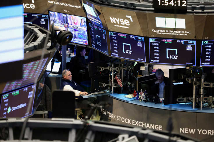 Traders work on the trading floor at the New York Stock Exchange (NYSE) in New York City