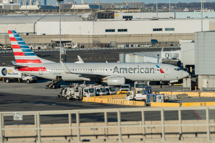 Passengers line up at John F. Kennedy International Airport in New York