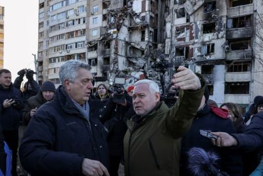Filippo Grandi, UN High Commissioner for Refugees, speaks with Kharkiv Mayor Ihor Terekhov as he visits Saltivka, Kharkiv