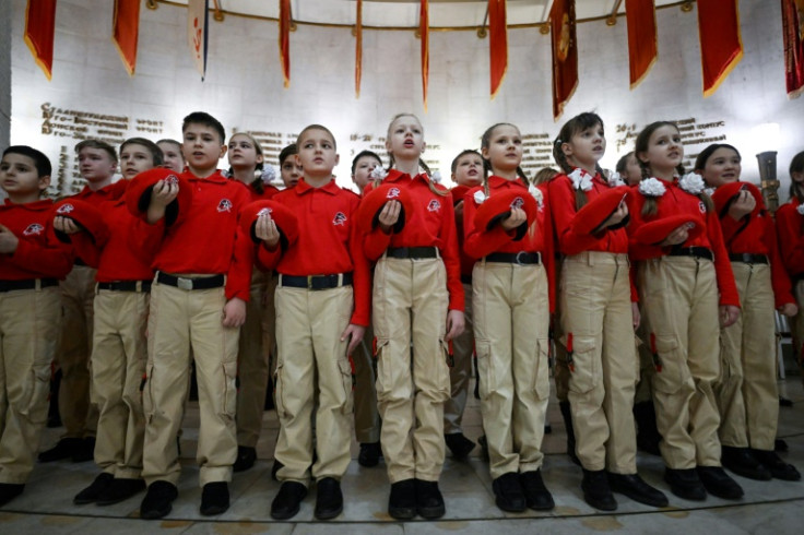 Russian teenagers attend a ceremony to join the patriotic Youth Army movement in Russia's southern city of Volgograd