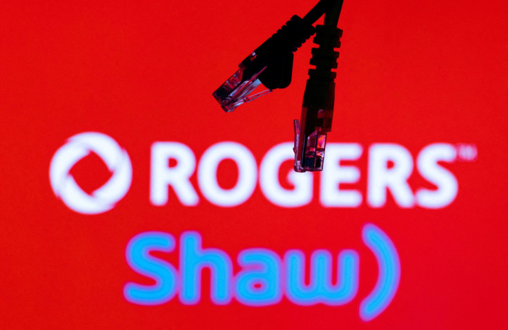 Illustration shows Rogers and Shaw Communications logos