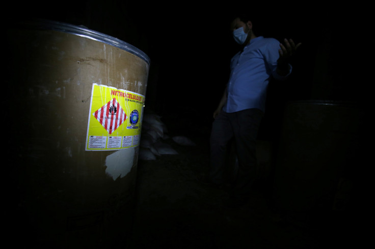 Chemical products are seen inside a former rebel position shown to journalists during a media tour in Douma near Damascus