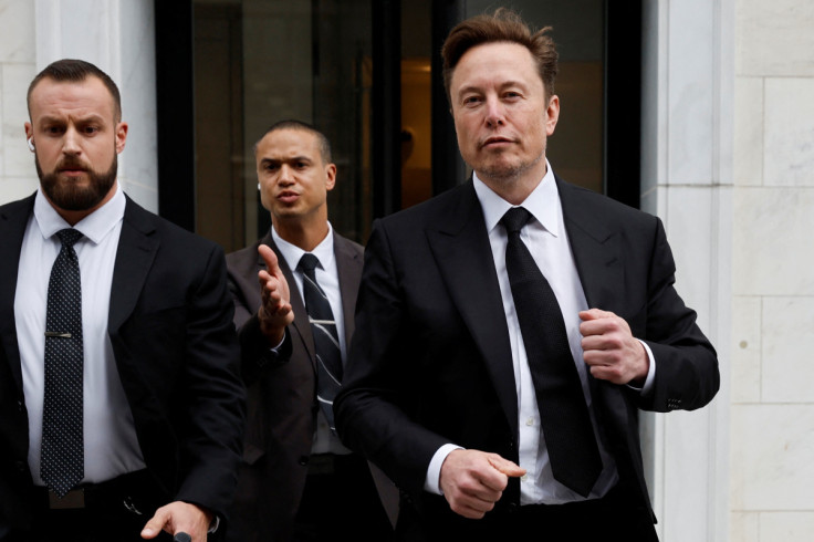 Tesla CEO Musk departs the company’s local office in Washington