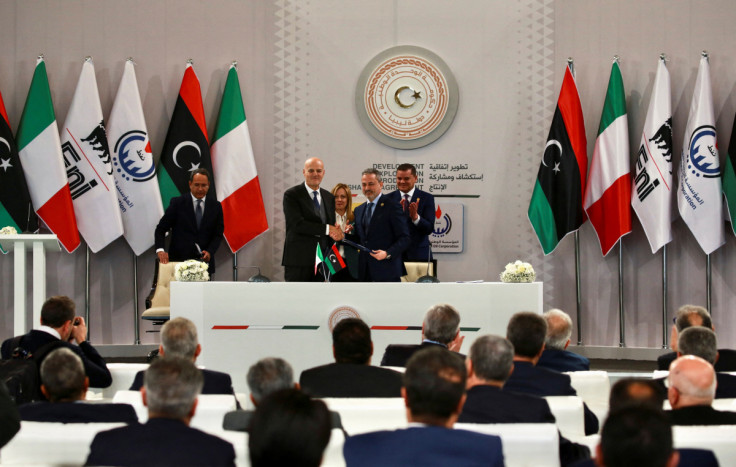 Eni Chief Executive Officer Claudio Descalzi and NOC head Farhat Bengdara attend an event to sign an agreement between the two companies in Tripoli