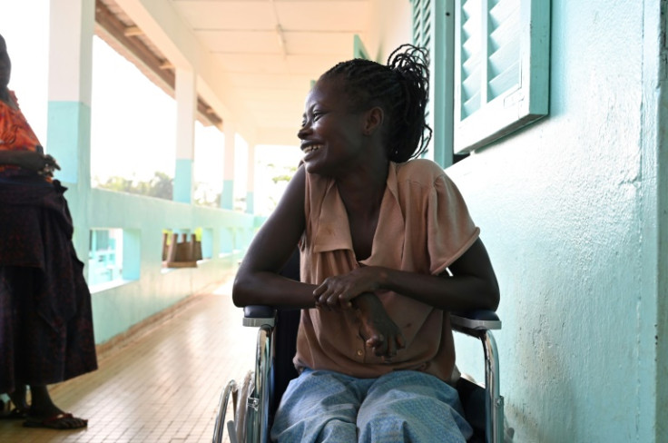Gisele Abena is in a wheelchair because leprosy has eaten away at her feet