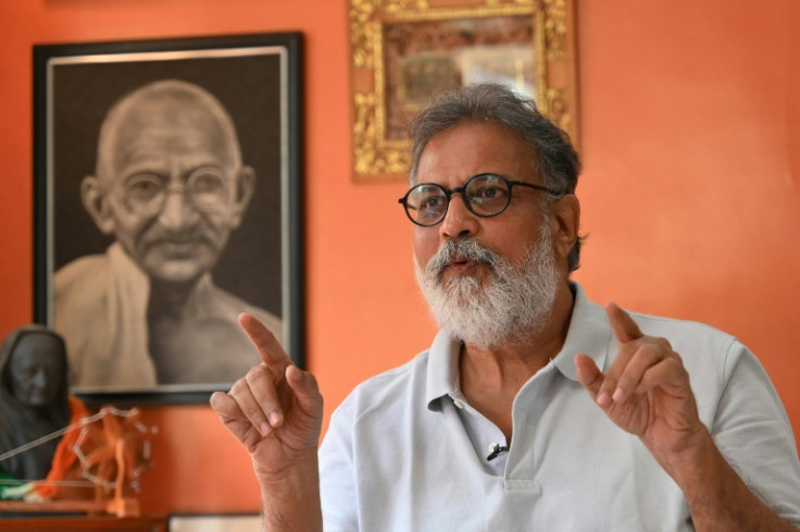 Tushar Gandhi speaks at his home in Mumbai before the 75th anniversary of the assassination of his great-grandfather, the Indian independence hero Mahatma Gandhi
