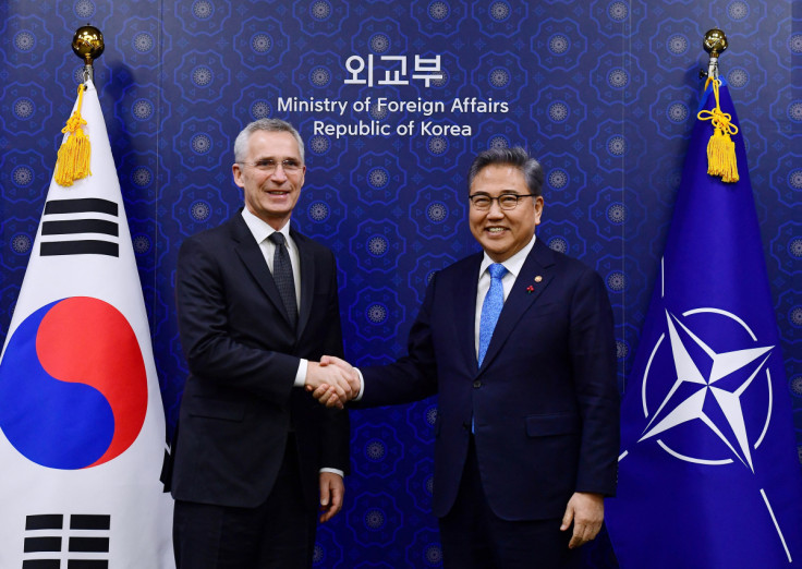 NATO Secretary General Stoltenberg shakes hands with South Korean Foreign Minister Park Jin during their meeting at the Foreign Ministry, in Seoul