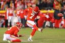 Harrison Butker of the Kansas City Chiefs kicks the game winning field goal to defeat the Cincinnati Bengals 23-20 in the AFC championship game