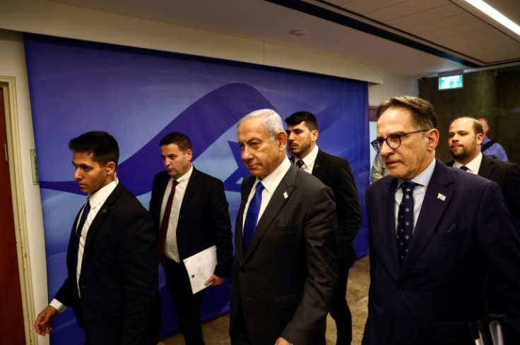 Israeli Prime Minister Benjamin Netanyahu and ministers arrive for the weekly cabinet meeting in Jerusalem on January 29, 2023