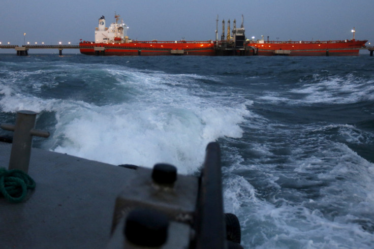 An oil tanker is docked while oil is pumped into it at the ships terminal of PDVSA's Jose Antonio Anzoategui industrial complex in the state of Anzoategui