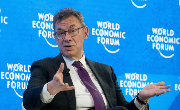 Bourla, CEO of Pfizer gestures  during a discussion at the World Economic Forum in Davos