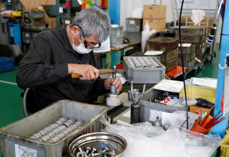 Worker assembles an air drill at the factory of manufacturer Katsui Kogyo in Higashiosaka