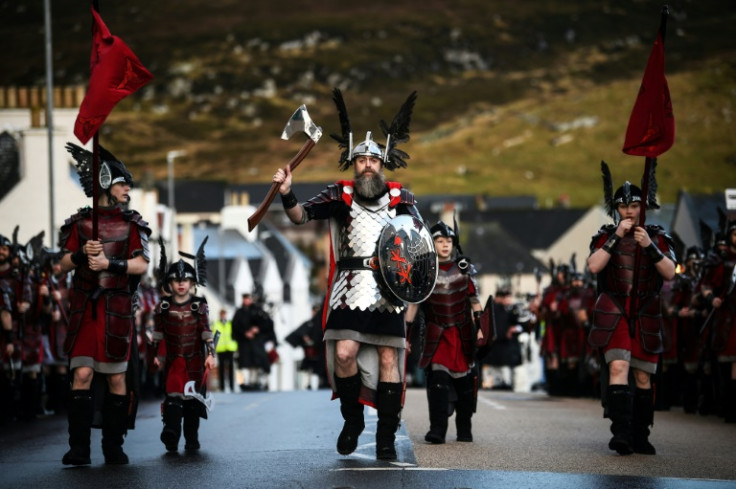 The annual parade through the streets culminates with a torch-lit procession and a replica longboat being set alight