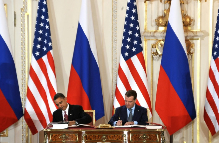 Barack Obama and Dmitry Medvedev, the the presidents of the United States and Russia, sign the New START treaty in Prague on April 8, 2010
