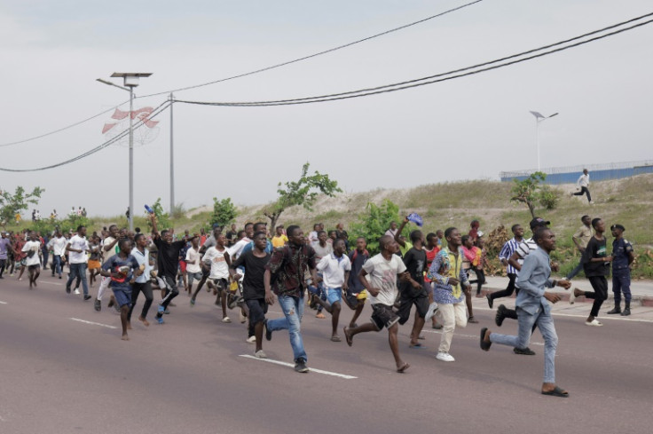 Kinshasa residents clamoured for a glimpse of the popemobile after Francis' arrival