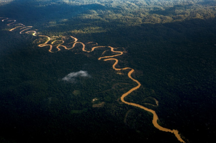 The Yanomami territory, the largest reservation in Brazil, sits on the country's northern border with Venezuela, spanning 96,000 square kilometers (37,000 square miles) and is home to around 30,000 Indigenous inhabitants