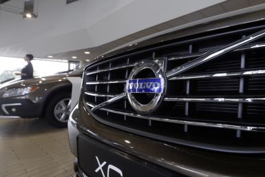 The Volvo logo is pictured on a car in a car dealership showroom in Riga
