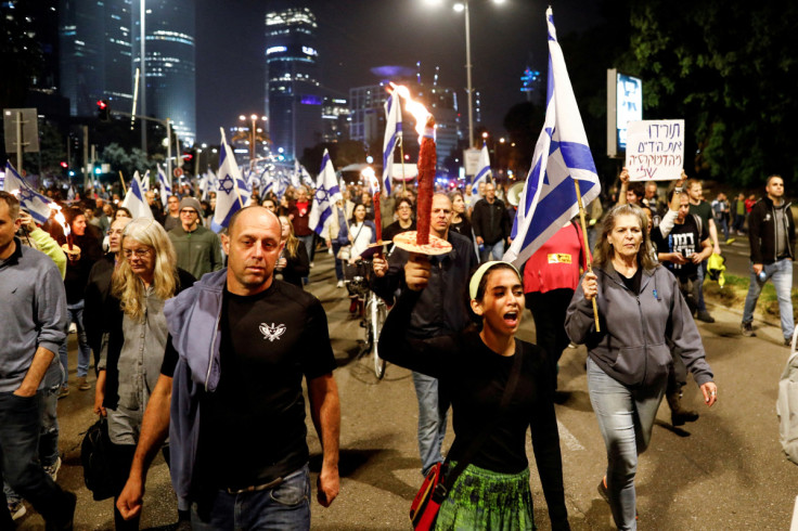 Israelis protest Prime Minister Benjamin Netanyahu's new right-wing coalition and its proposed judicial reforms, in Tel Aviv