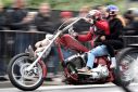 A biker rides his Harley-Davidson during a parade at the "Hamburg Harley Days" in Hamburg