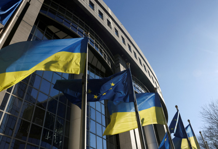 Flags of European Union and Ukraine flutter outside EU Parliament building, in Brussels