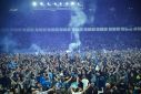 Everton fans invaded the pitch after securing Premier League survival last season