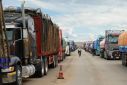 Some 300 trucks were backed up at a key border point between Peru and Bolivia on February 2, 2023, as ongoing strikes clogged roads