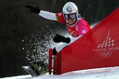 Fletcher from the US competes in the women's snowboard parallel giant slalom competition at the Torino Winter Olympic Games