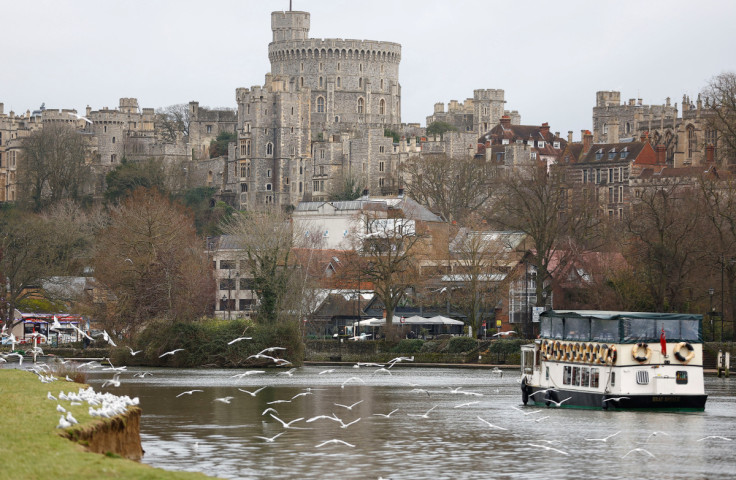 A leisure cruiser is seen on the River Thames near Windsor Castle, in Eton