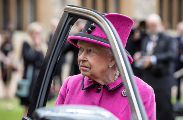 Britain's Queen Elizabeth talks to recipients of new "Motability" vehicles during a ceremony in Windsor Castle, Windsor