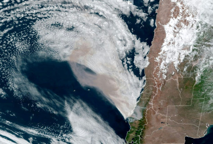 This satellite image from the US National Oceanic and Atmospheric Administration/Regional and Mesoscale Meteorology Branch shows smoke (C) rising from fires in southern Chile on February 4, 2023